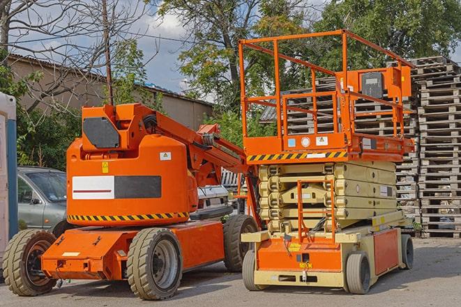 busy forklift activity in a well-maintained warehouse facility in College Grove TN